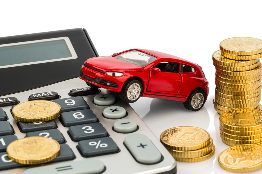 car and calculator. rising costs for buying a car, leasing, work